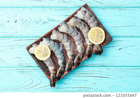 Raw big tiger ( king ) shrimps Cleaned, Peeled & Deveined photography . Top view 121055847