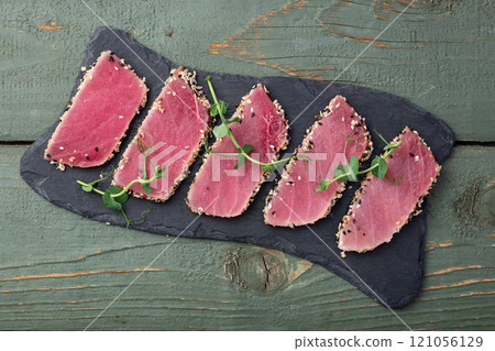 Sliced tuna steak with sesame photography . Top view Sliced tuna steak with sesame photography . Top view 121056129