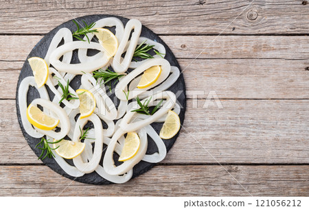 Squid tube and ring photography . Seafood top view 121056212
