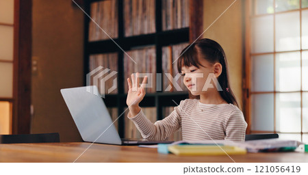 Wave, video call and child with laptop, education and girl with scholarship, elearning and listening. Home, greeting and online class for kid, virtual and youth with tech, communication and Japan 121056419