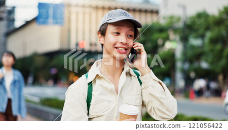 Street, male student and phone call with coffee for university communication or happy for application feedback. Japanese person, smile or talking to contact for discussion and scholarship information Street, male student and phone call with coffee for university communication or happy for application feedback. Japanese person, smile or talking to contact for discussion and scholarship information 121056422