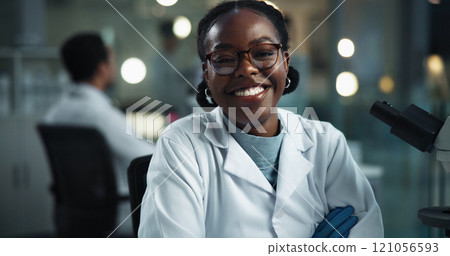 Woman, scientist and lab portrait at night with smile, science research and medical study. Happy, scientific pride and healthcare professional with confidence and pharma breakthrough at job. 121056593