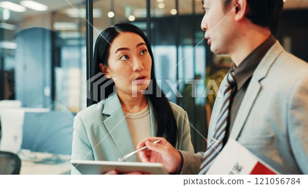 Business, discussion or people with tablet in office for signature on funding request application or budget planning. Accountant, employee or digital contract for investment approval at Japanese firm 121056784