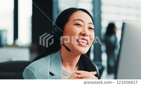 Woman, computer and customer center agent in office, speaking and advisor to client. Female person, help desk representative and support consumer with loan, Japan and insurance agency on website 121056817