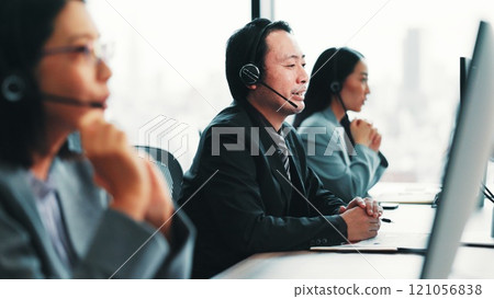 Virtual assistant, telecom or Japanese man on computer in call center for consulting, online help or loan advice. Coworking, consultant or agent with service for telemarketing or sales communication Virtual assistant, telecom or Japanese man on computer in call center for consulting, online help or loan advice. Coworking, consultant or agent with service for telemarketing or sales communication 121056838