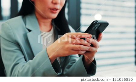 Hands, email or businesswoman with phone, news updates or social media for internet search. Office break, closeup or accountant texting on mobile app for chat, message or online notification in Japan 121056850