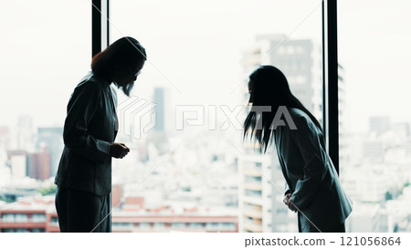 Japanese, business women and bow in office for respect, team or greeting as negotiation or meeting. Partnership, agreement and welcome with thank you, colleagues and collaboration in legal settlement 121056864