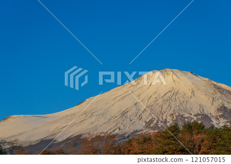 Mt. Fuji in autumn with autumn leaves and snow on the side of the roadside station Subashiri 121057015