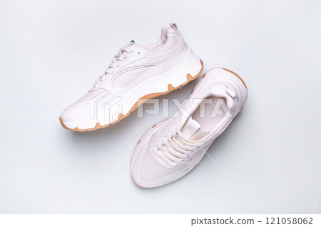 White sneakers on white background, including clipping path White sneakers on white background, including clipping path 121058062