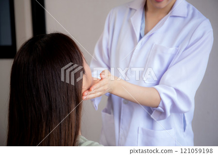 Young asian patient woman consulting with doctor in coat about wrinkle and skin for rejuvenate. 121059198