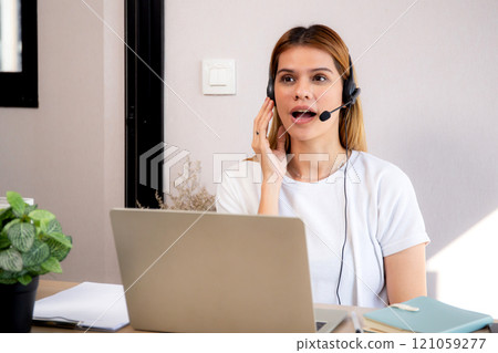 Professional young business woman working and meeting online in modern home office. 121059277