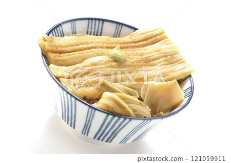 Conger eel rice bowl topped with wasabi and pickled ginger photographed on a white background Conger eel rice bowl topped with wasabi and pickled ginger photographed on a white background 121059911