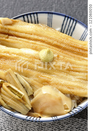 Conger eel rice bowl topped with wasabi and pickled ginger 121060050