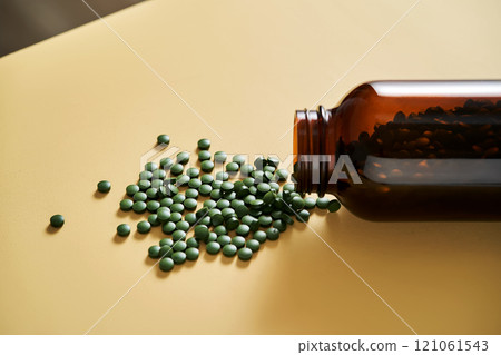 Superfood chlorella in tablet form. 121061543