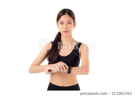 Happy young asian woman looking smartwatch for exercise and aerobics with cardio isolated. 121061563