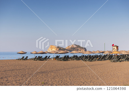 Sarigerme beach, Turkey. Baba island is on the background. Sarigerme beach, Turkey. Baba island is on the background. 121064398