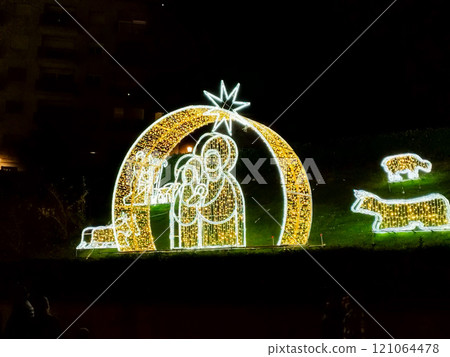 Christmas. Light. Christmas lights through the streets of Madrid. Decorating streets of the city. Fir tree with Christmas lights. Christmas ball. On. MADRID. SPAIN. 11 December 2024. Christmas. Light. Christmas lights through the streets of Madrid. Decorating streets of the city. Fir tree with Christmas lights. Christmas ball. On. MADRID. SPAIN. 11 December 2024. 121064478