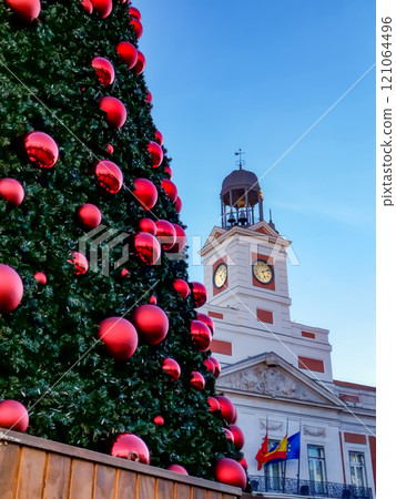 Christmas. Light. Christmas lights through the streets of Madrid. Decorating streets of the city. Fir tree with Christmas lights. Christmas ball. On. MADRID. SPAIN. 11 December 2024. 121064496