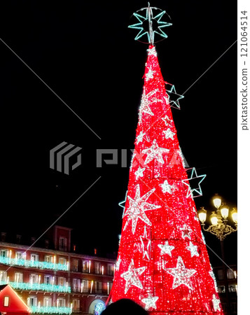 Christmas. Light. Christmas lights through the streets of Madrid. Decorating streets of the city. Fir tree with Christmas lights. Christmas ball. On. MADRID. SPAIN. 11 December 2024. 121064514