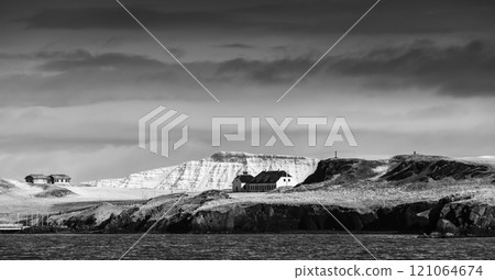Panoramic landscape with snowy coastal mountains, Iceland 121064674