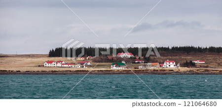 Iceland. Panoramic rural landscape with small residential houses Iceland. Panoramic rural landscape with small residential houses 121064680