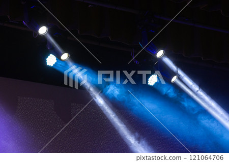 Beams of scenic spot lights in smoke over dark background Beams of scenic spot lights in smoke over dark background 121064706