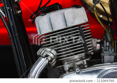 Vintage motorcycle engine, close up photo 121064760