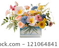 Pretty pastel-colored flowers arranged in a square clear glass or acrylic vase 121064841