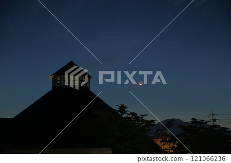 Hakushu Town, Hokuto City, the moon rising in the dawn sky on the first day of the month, the thin moon in earthshine Hakushu Town, Hokuto City, the moon rising in the dawn sky on the first day of the month, the thin moon in earthshine 121066236