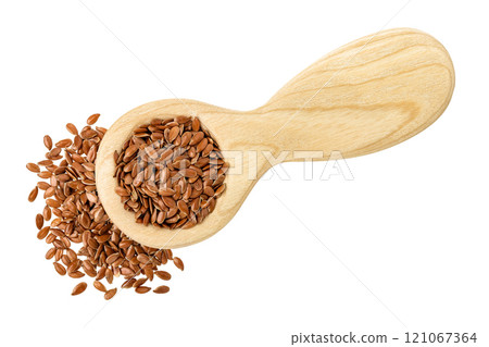 flaxseed in wooden spoon isolated on white background. Top view. Flat lay flaxseed in wooden spoon isolated on white background. Top view. Flat lay 121067364