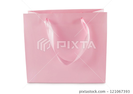 Recycled pink paper kraft shopping bag isolated on a white background 121067393