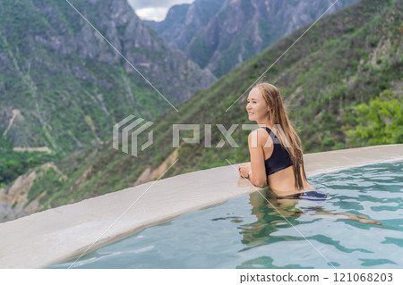 Female tourist at the hot springs of Grutas Tolantongo, Mexico. Adventure, relaxation, and natural wellness concept 121068203