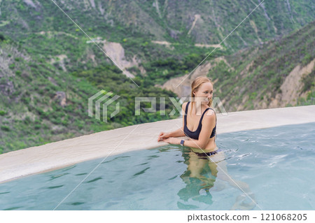 Female tourist at the hot springs of Grutas Tolantongo, Mexico. Adventure, relaxation, and natural wellness concept 121068205