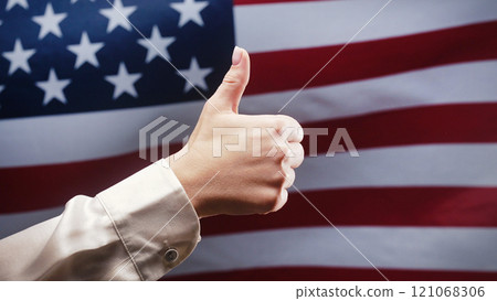 Woman Makes Hand Sign Like, Thumb Up Gesture On Usa Flag. United States Deal Woman Makes Hand Sign Like, Thumb Up Gesture On Usa Flag. United States Deal 121068306