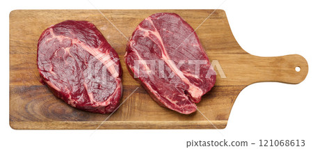 Raw beef steak chuck eye roll on wooden board, top view Raw beef steak chuck eye roll on wooden board, top view 121068613