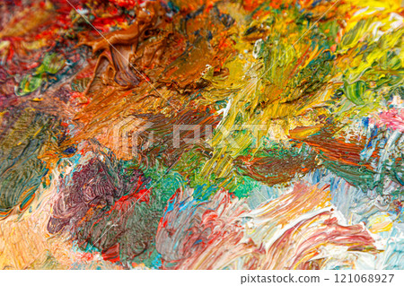 painting palette with different colors of paint 121068927