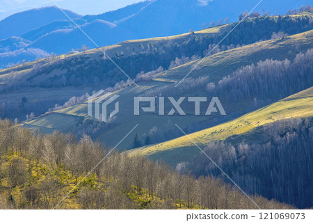 Nice sunset light over the hills 121069073