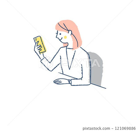 A smiling woman who operates a smartphone A smiling woman who operates a smartphone 121069886