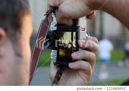 Capturing Beautiful Moments A Dedicated Photographer in Action During Work and Play 121069952