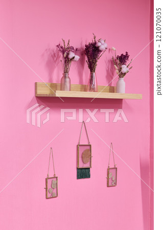 Stylish and chic Pink Wall Decor featuring Dried Flowers creatively complemented by Art Frames Stylish and chic Pink Wall Decor featuring Dried Flowers creatively complemented by Art Frames 121070035