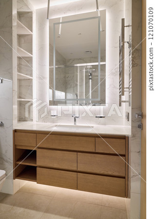 Explore modern bathroom designs with elegant features, stylish lighting, and functionality 121070109