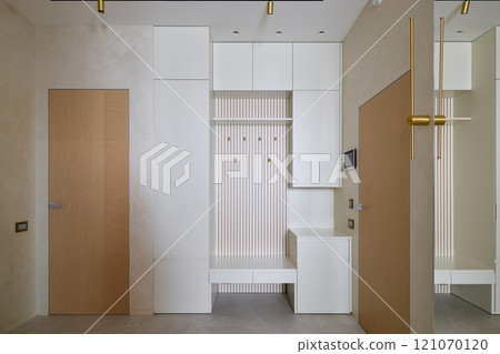 Discover a minimalist entryway design with stylish storage solutions to enhance your homes look 121070120