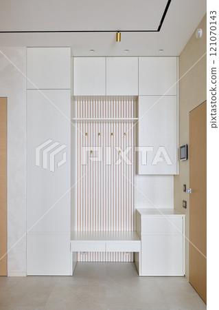 An Elegant and Modern Hallway featuring harmonious Minimalist Design Elements and aesthetics An Elegant and Modern Hallway featuring harmonious Minimalist Design Elements and aesthetics 121070143