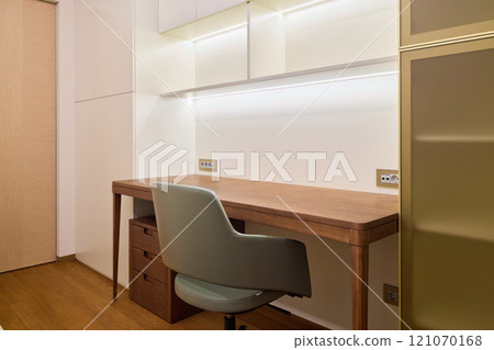 A Modern Workspace Featuring a Minimalistic Design That Emphasizes Natural Light and Comfort A Modern Workspace Featuring a Minimalistic Design That Emphasizes Natural Light and Comfort 121070168