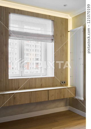 Modern minimalist design includes natural wooden accents that enhance beauty and functionality Modern minimalist design includes natural wooden accents that enhance beauty and functionality 121070199