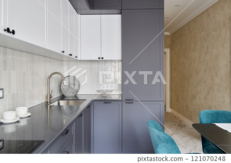 Explore the world of modern kitchen design featuring sleek cabinets and contemporary decor styles Explore the world of modern kitchen design featuring sleek cabinets and contemporary decor styles 121070248