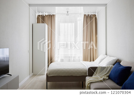 A Modern Minimalist Bedroom that is filled with beautiful Natural Light and elegance 121070304