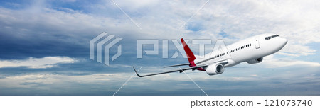 Commercial airplane flying in the sky with cloudscapes background Commercial airplane flying in the sky with cloudscapes background 121073740