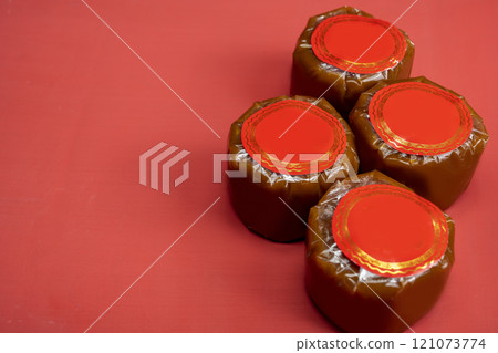 Chinese New Year rice cake or Nian Gao on the table. Also popular as Kue Keranjang or Dodol China 121073774