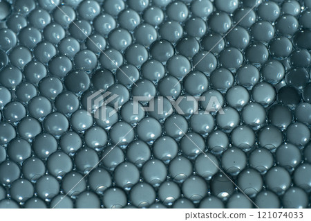 Blue water gel balls. Polymer gel. Silica gel. Balls of hydrogel round shape. Crystal liquid ball with reflection. Water beads 121074033